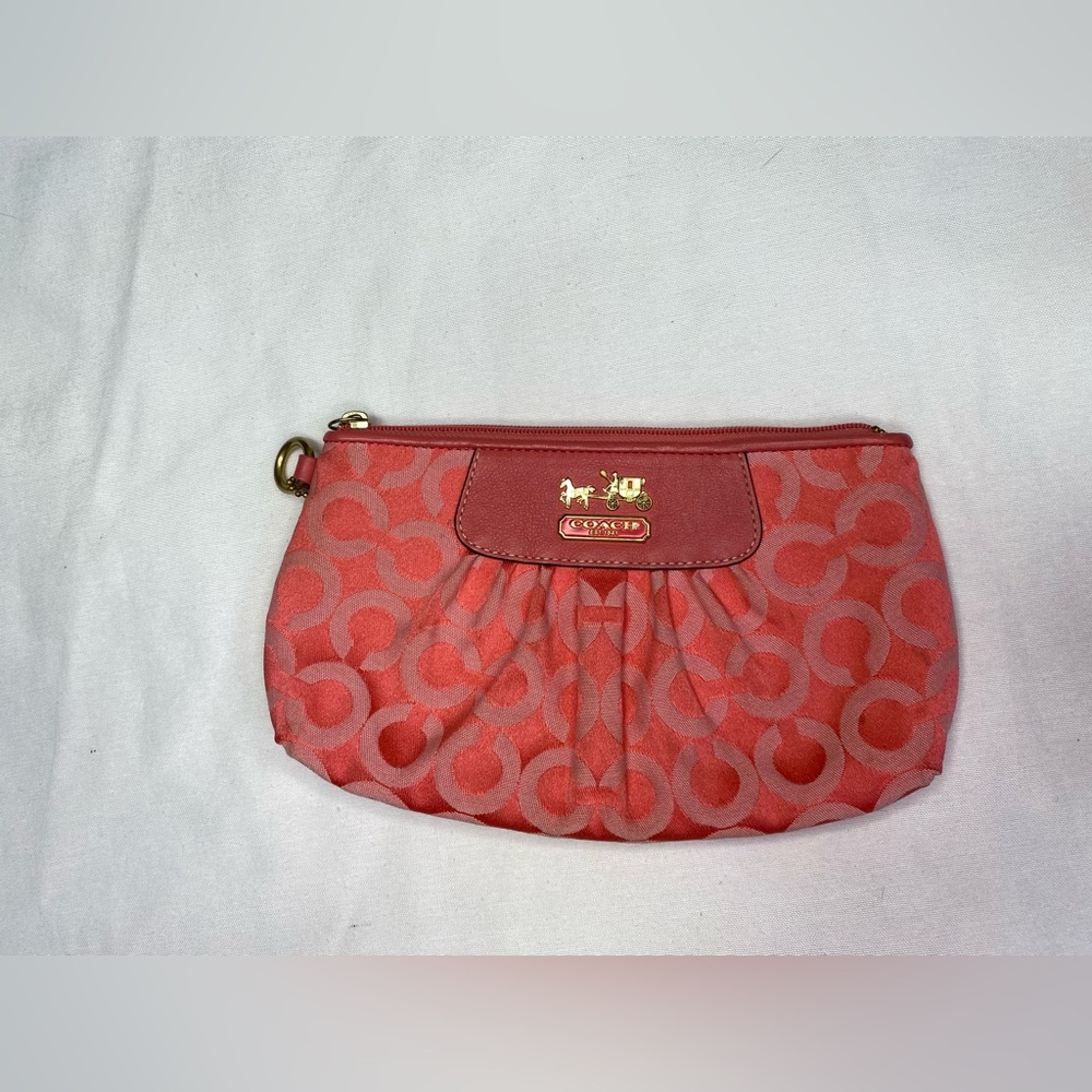 Coach clutch vintage pink with brown on the inside